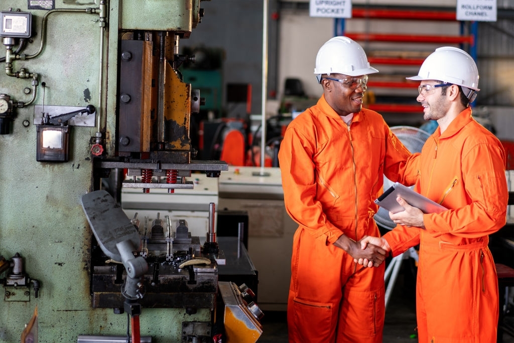 Engineering shaking hands in industrial.